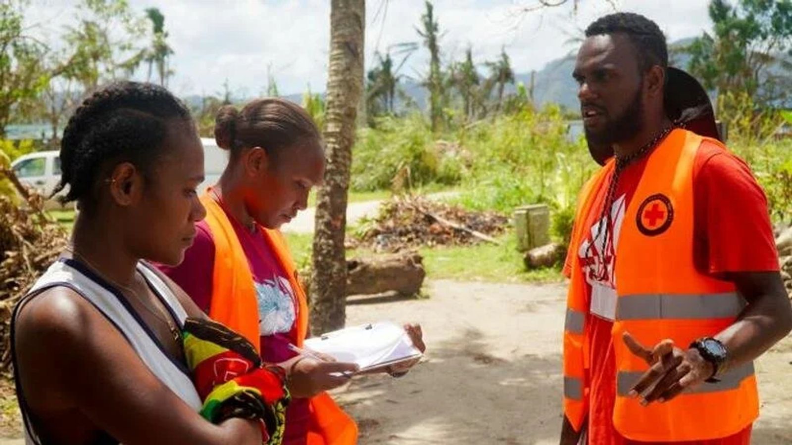 Vanuatu Red Cross volunteers Jeff and Hilda conduct damage