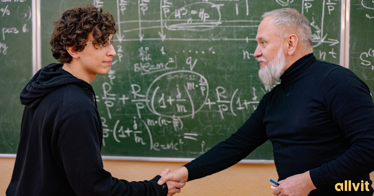 Adjunkt håndhilser på elev. Foto.