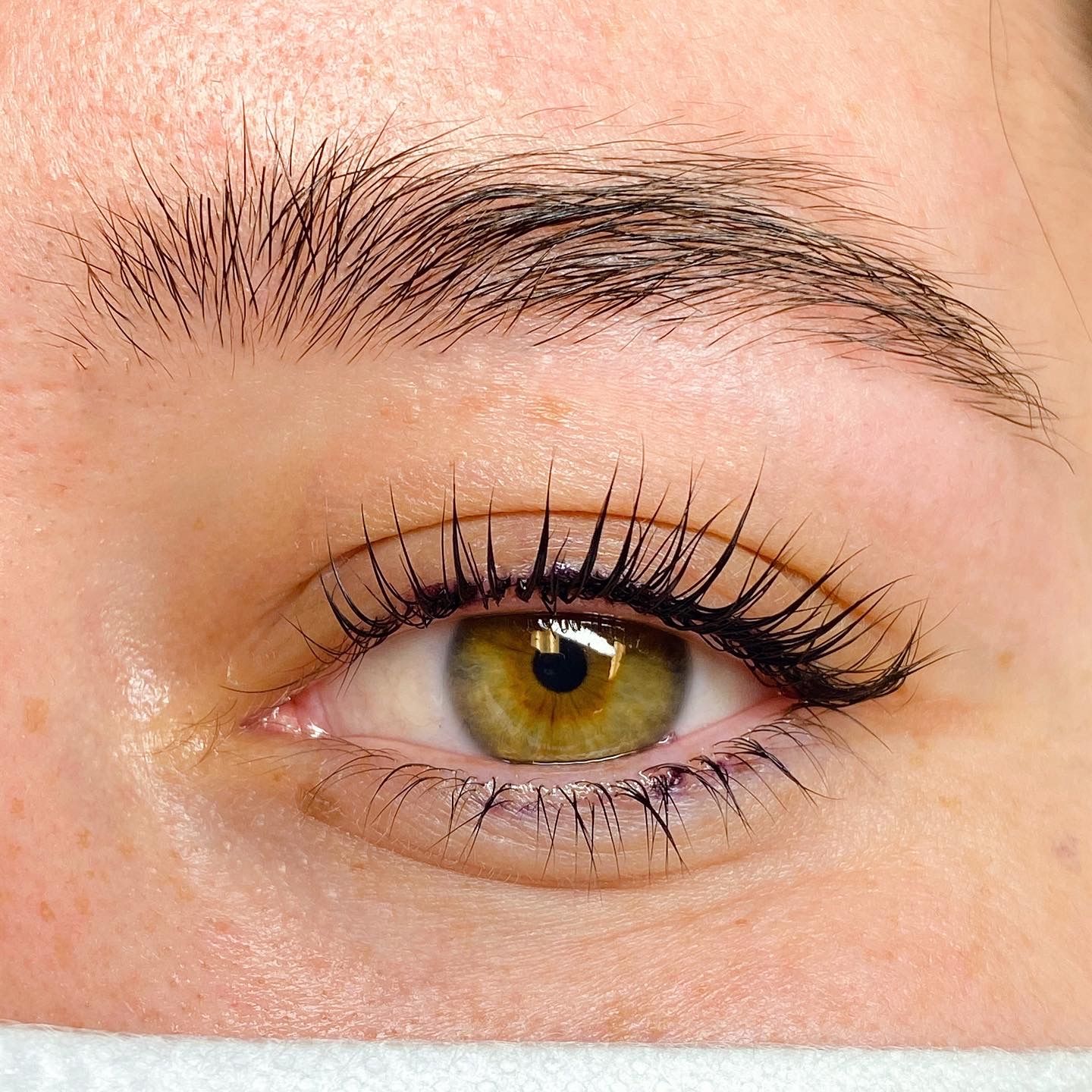Close up of an eye with the lash lift. 
