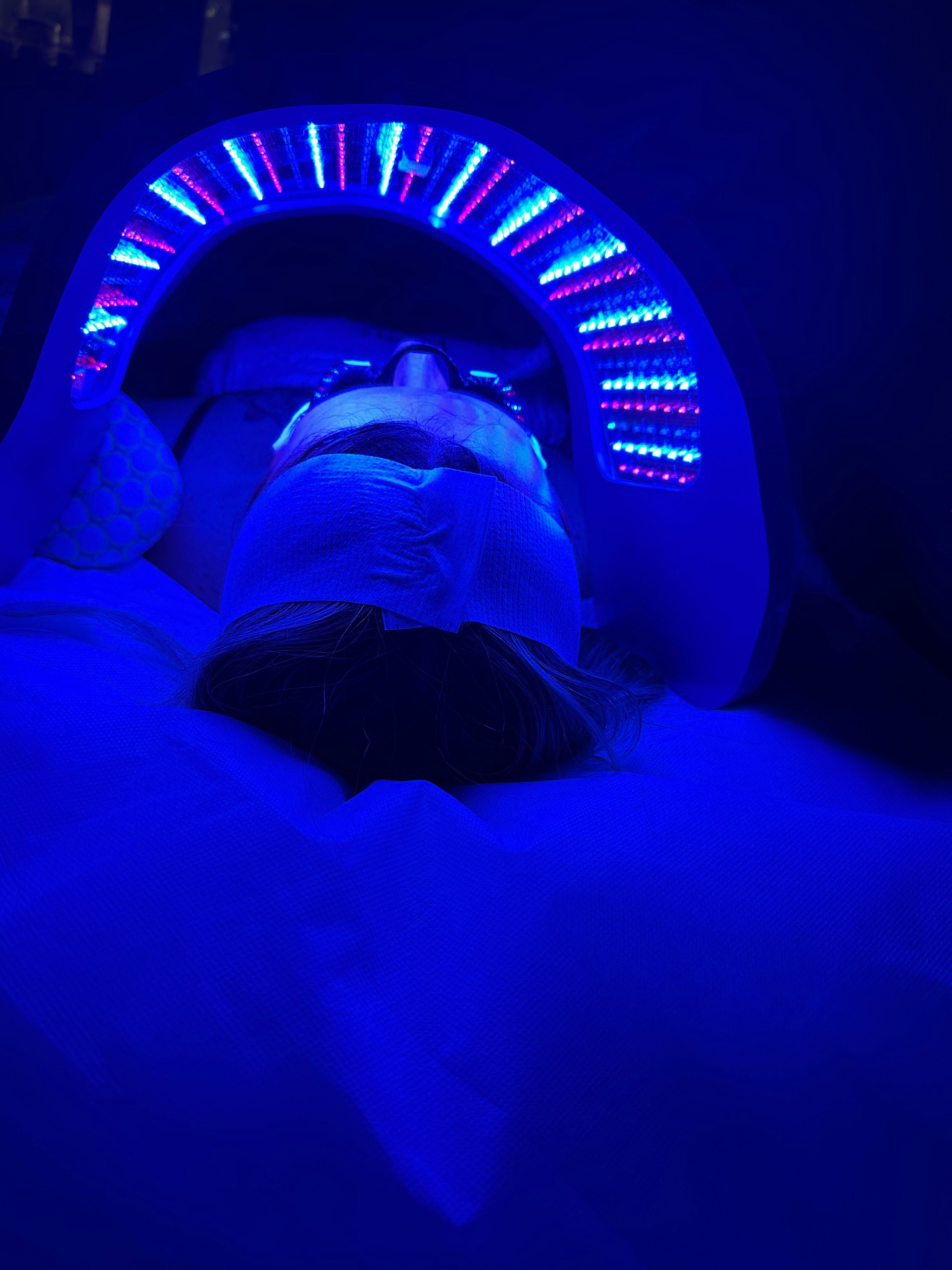A person receiving LED blue light therapy 