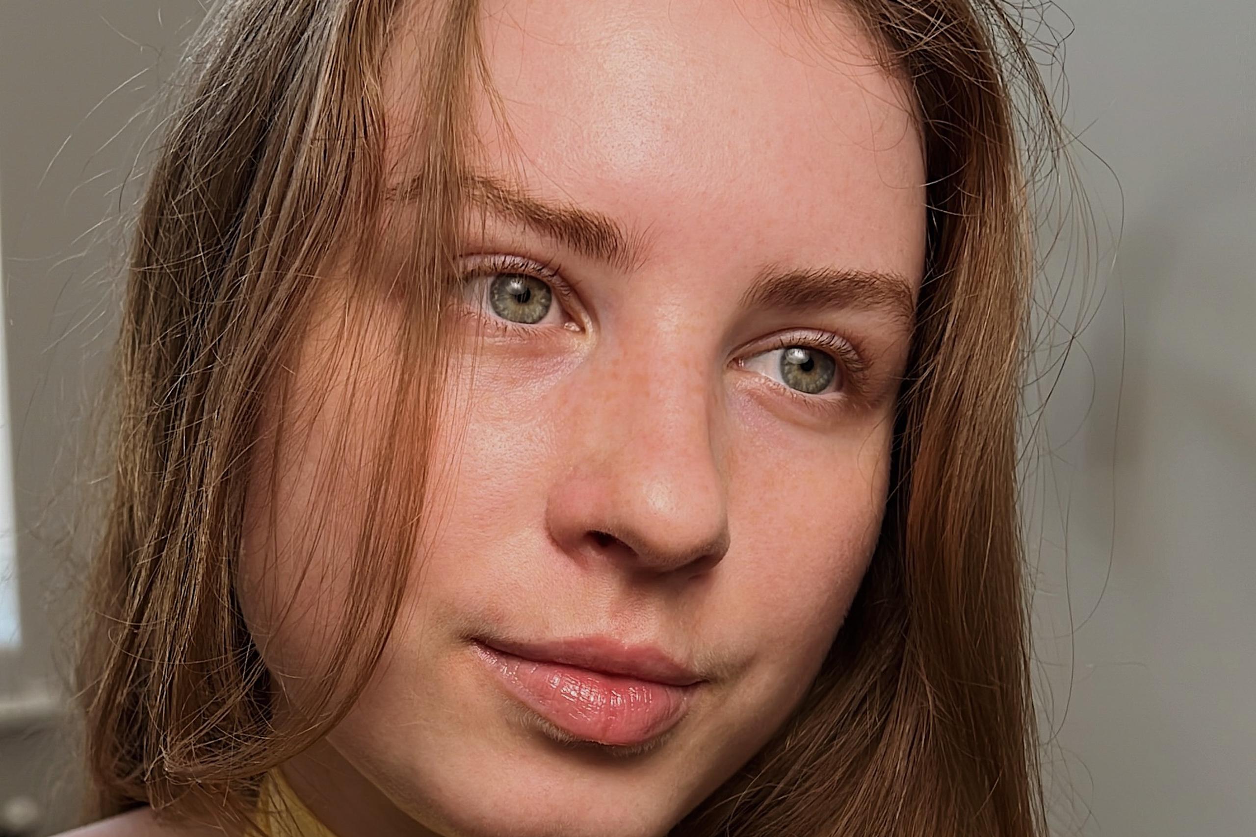 Close-up of a woman showing natural eyelashes