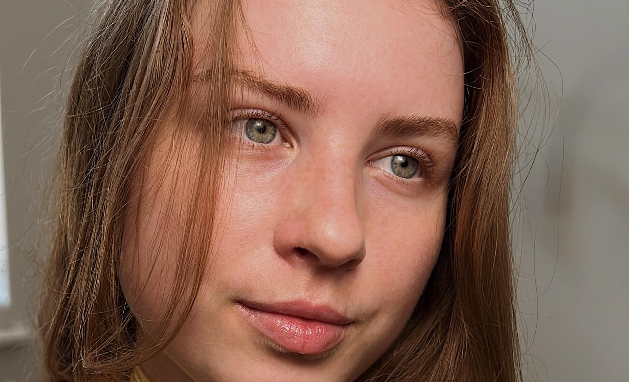 Close-up of a woman showing natural eyelashes