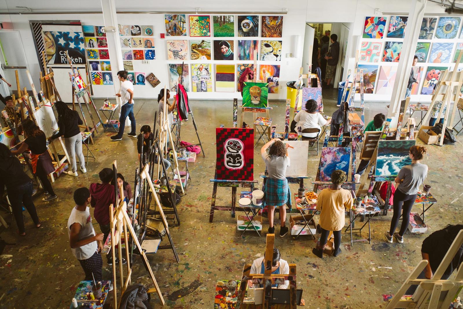 Teen artists at work at their easel's in our expansive Painting Studio