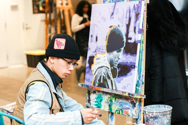 Teen artist creating a work of art for AFH's collection