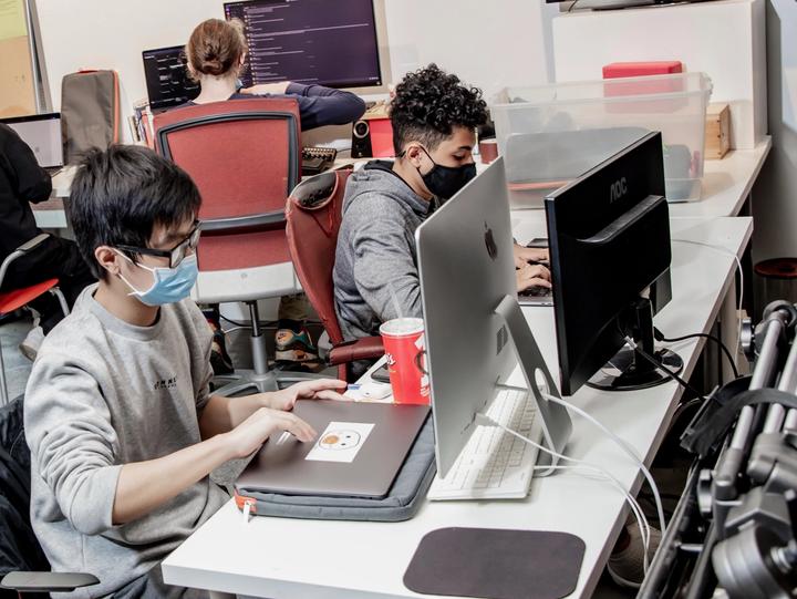 Teen coders working on projects