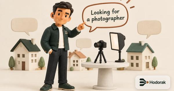 How to get photography clients: Nabih points at a copper bubble reading Looking for a photographer