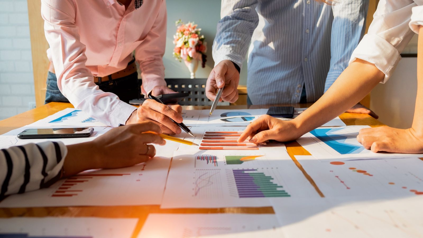 Business Team Analyzing Data | Savory & Partners