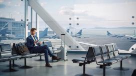 Traveler in Airport Lounge | Savory & Partners Traveler in Airport Lounge | Savory & Partners