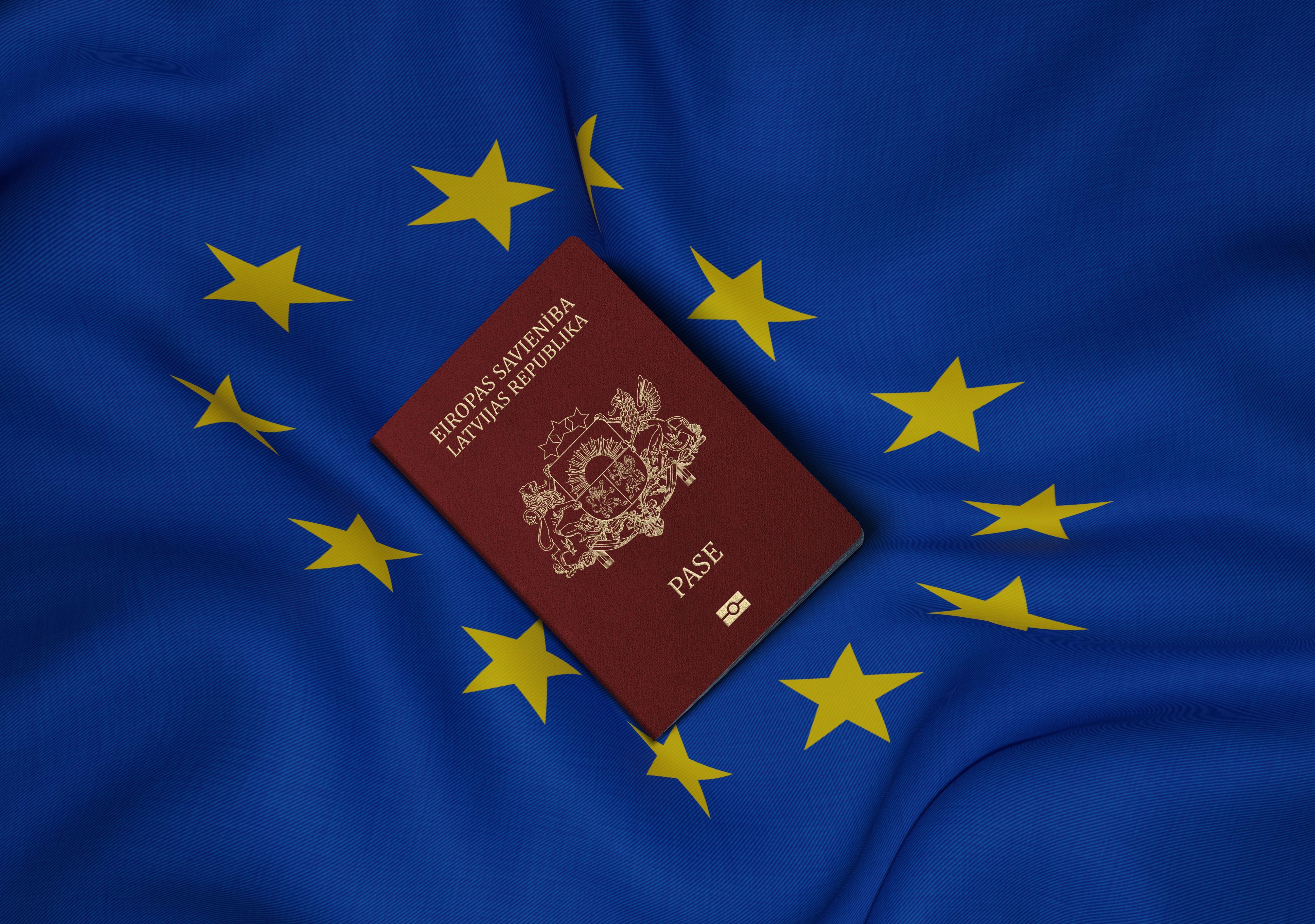 Latvia passport on eu flag