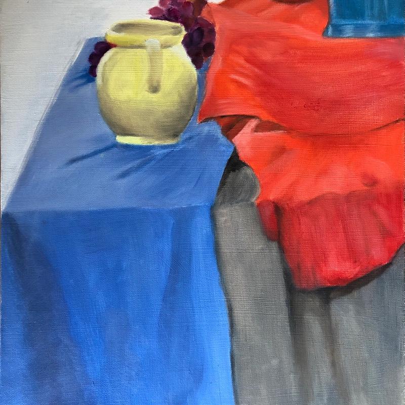 Fruits and jug on tablecloth