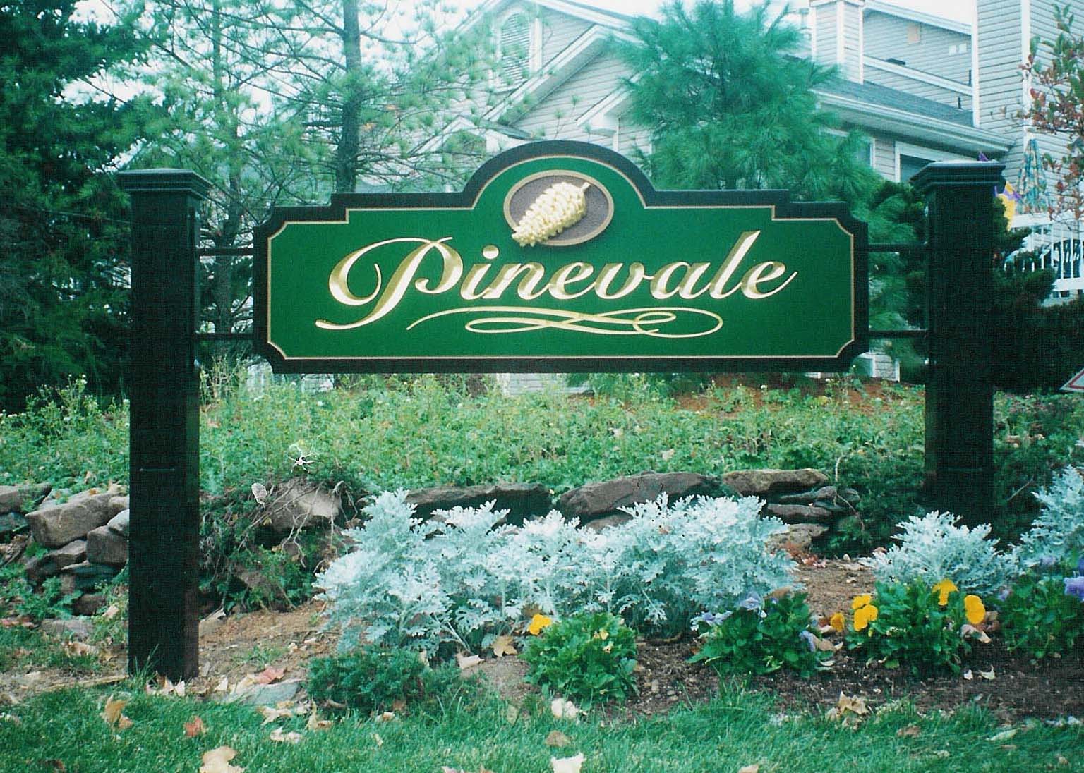 Carved sign for Pinevale