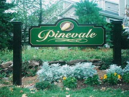 Carved sign for Pinevale