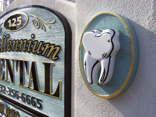 Millennium Dental custom sandblasted sign