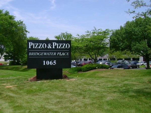 Interally illuminated sign for Pizzo & Pizzo