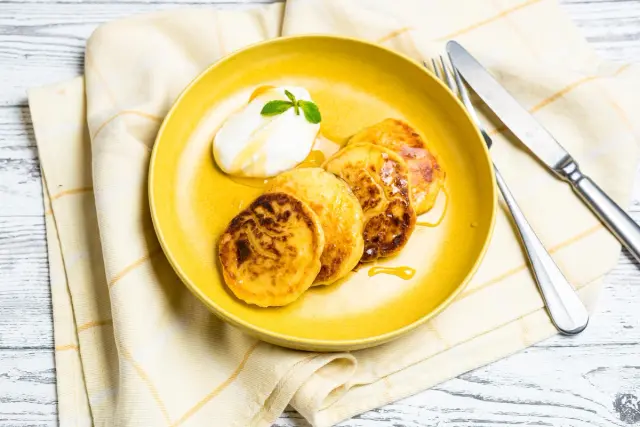 Orange Syrniki with Greek Yogurt & Honey