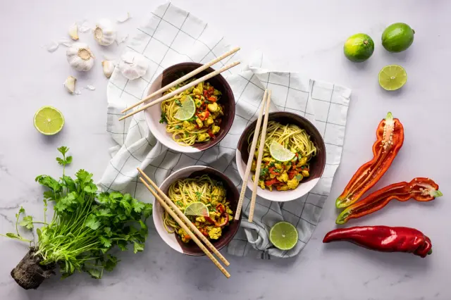 Thai Chicken Curry with Rice Noodles, Vegetables, and Lime