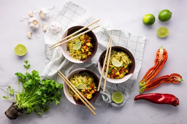 Thai Chicken Curry with Rice Noodles, Vegetables, and Lime