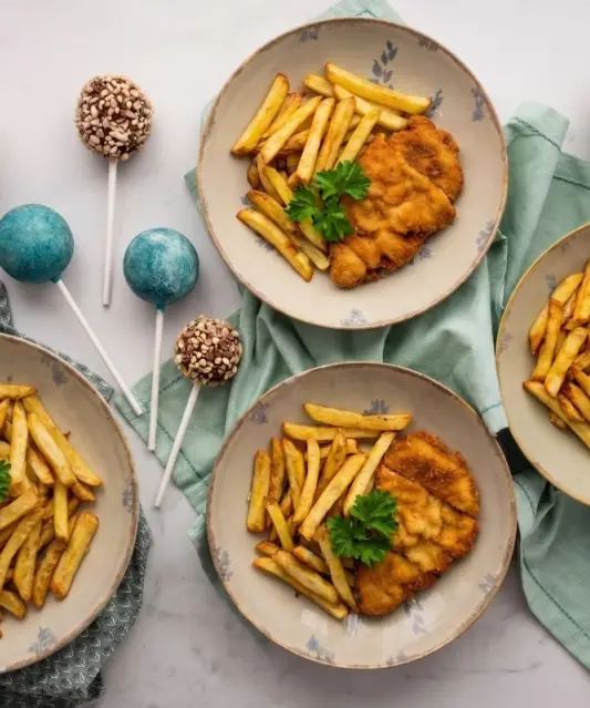 Breaded Chicken Schnitzels with Roasted Fries, Peach Compote & Raw Lollipops