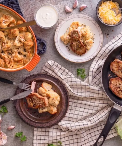 Pork Slices with Baked Cauliflower, Cheese and Potatoes