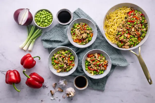 Chicken Strips in Tamari Sauce with Edamame, Egg Noodles and Sesame