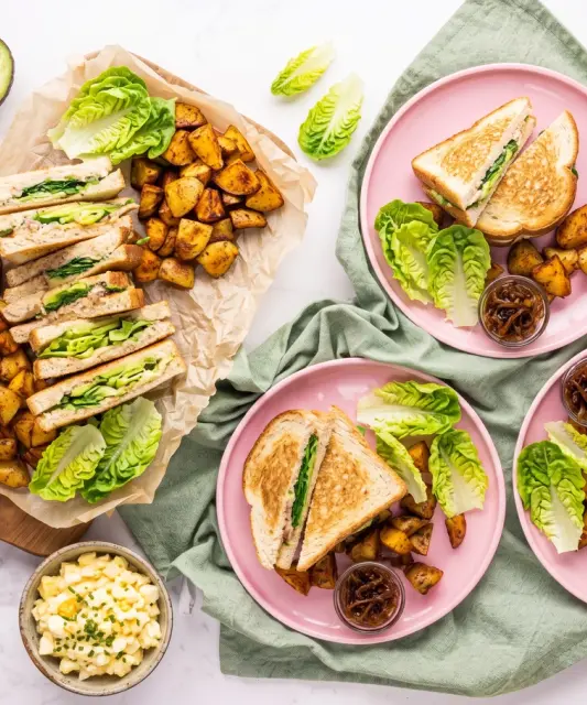 Avo Sandwiches with Egg Spread, Cheddar, Caramelized Onion, and Potatoes