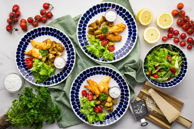 Crispy Chicken with Parmesan Potatoes & Herb Sauce