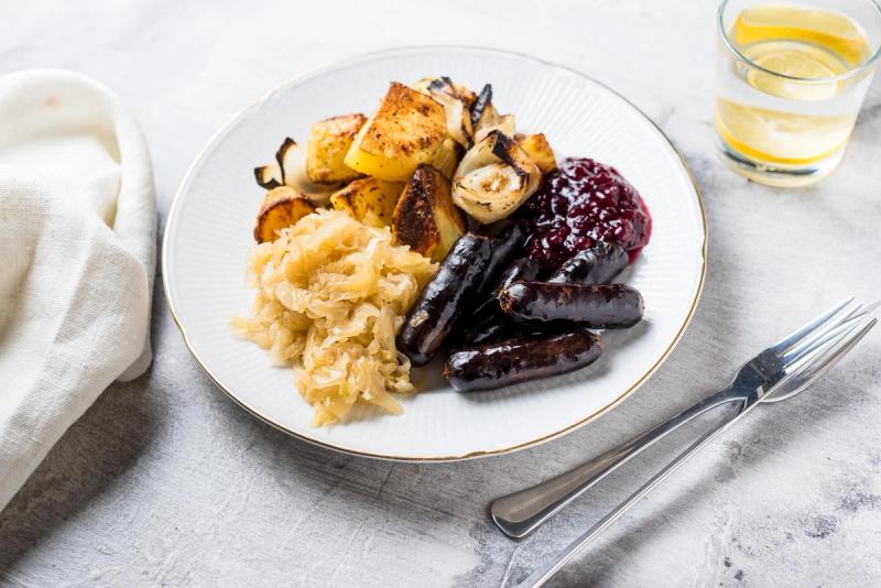 Blood Sausages with Baked Potatoes, Fried Sauerkraut & Lingonberry Jam