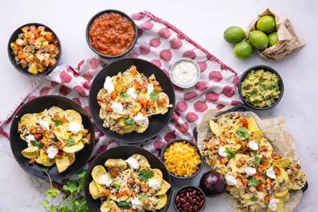 Baked Chicken Nachos with Guacamole, Salsa and Sour Cream