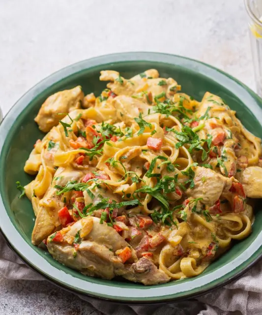 Creamy chicken pasta with paprika and parmesan
