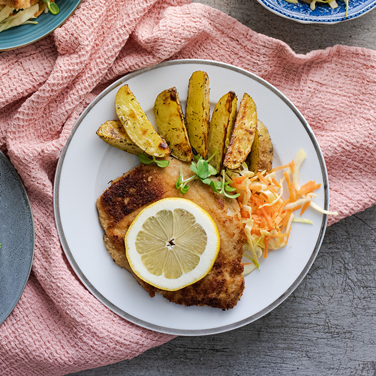 Crispy Breaded Schnitzels with Potato Wedges and Light Cabbage Salad | Yummy