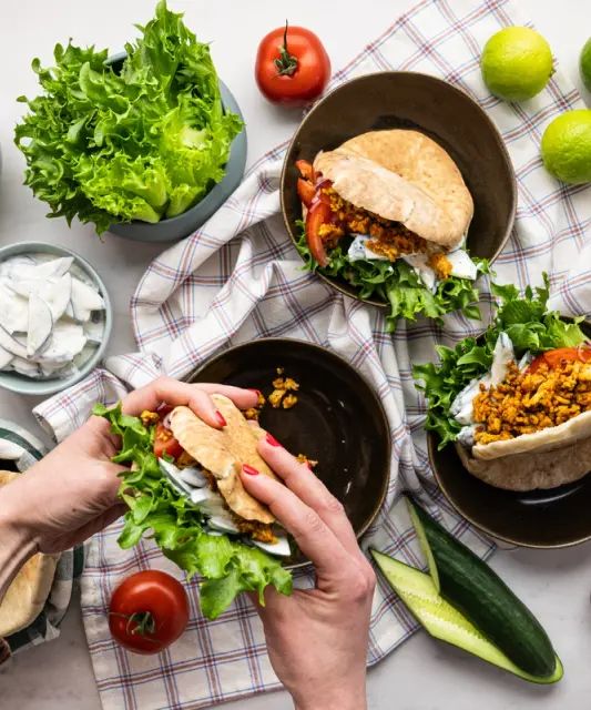 Pita Breads with Tex-Mex Chicken & Sour Cream Cucumbers Flavored with Lime