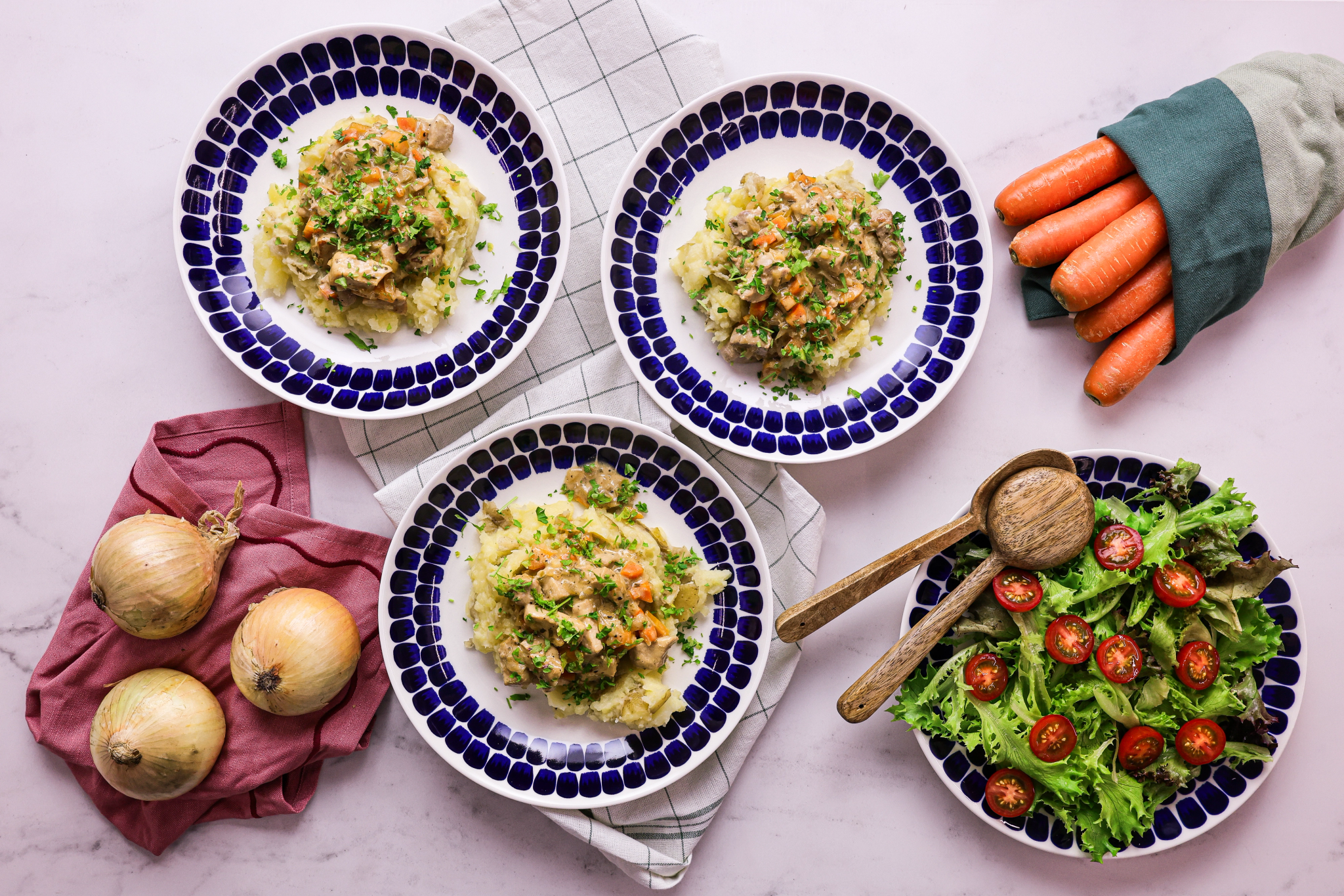 Creamy Herbed Pork Strips with Mashed Potatoes and Salad