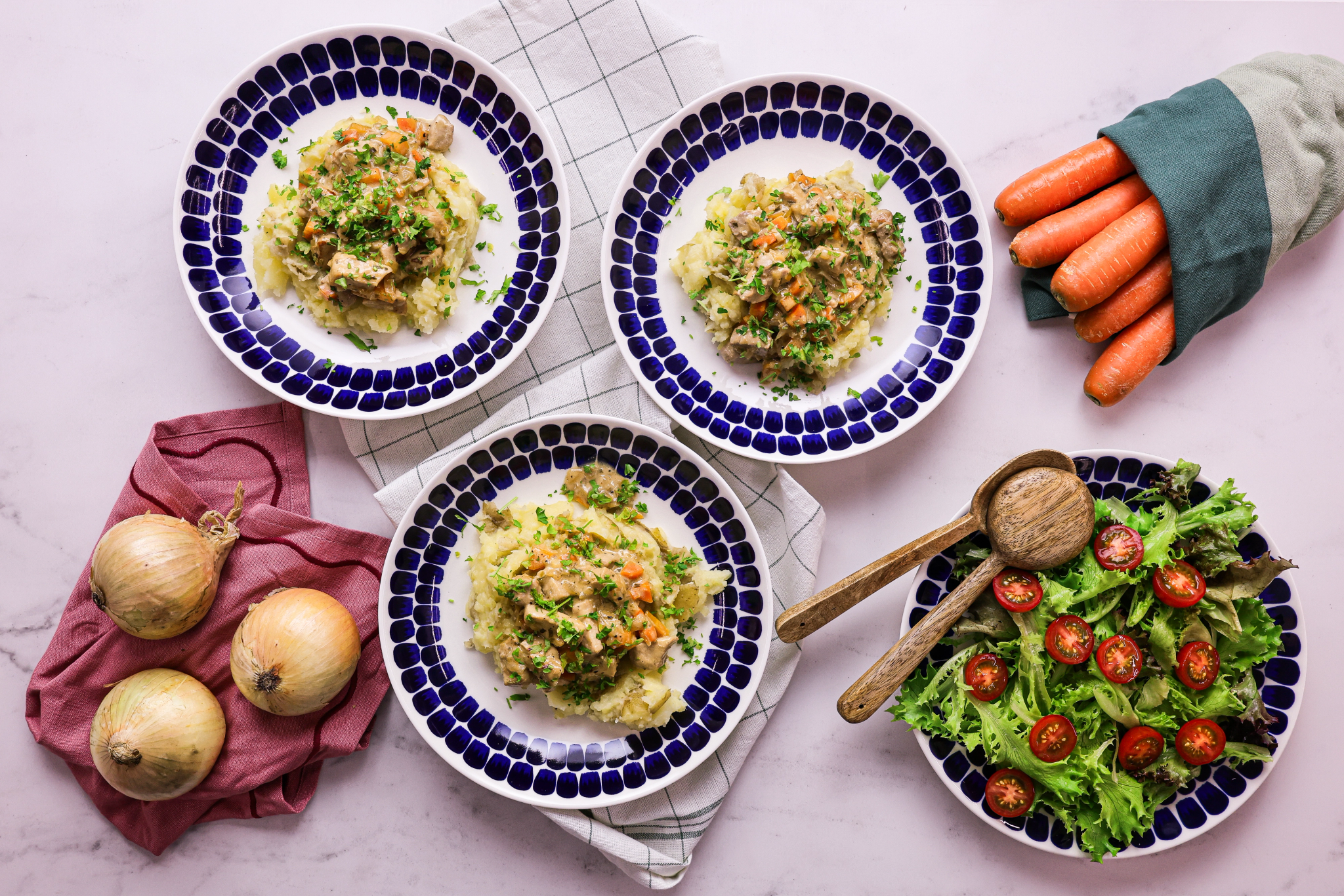 Creamy Herbed Pork Strips with Mashed Potatoes and Salad