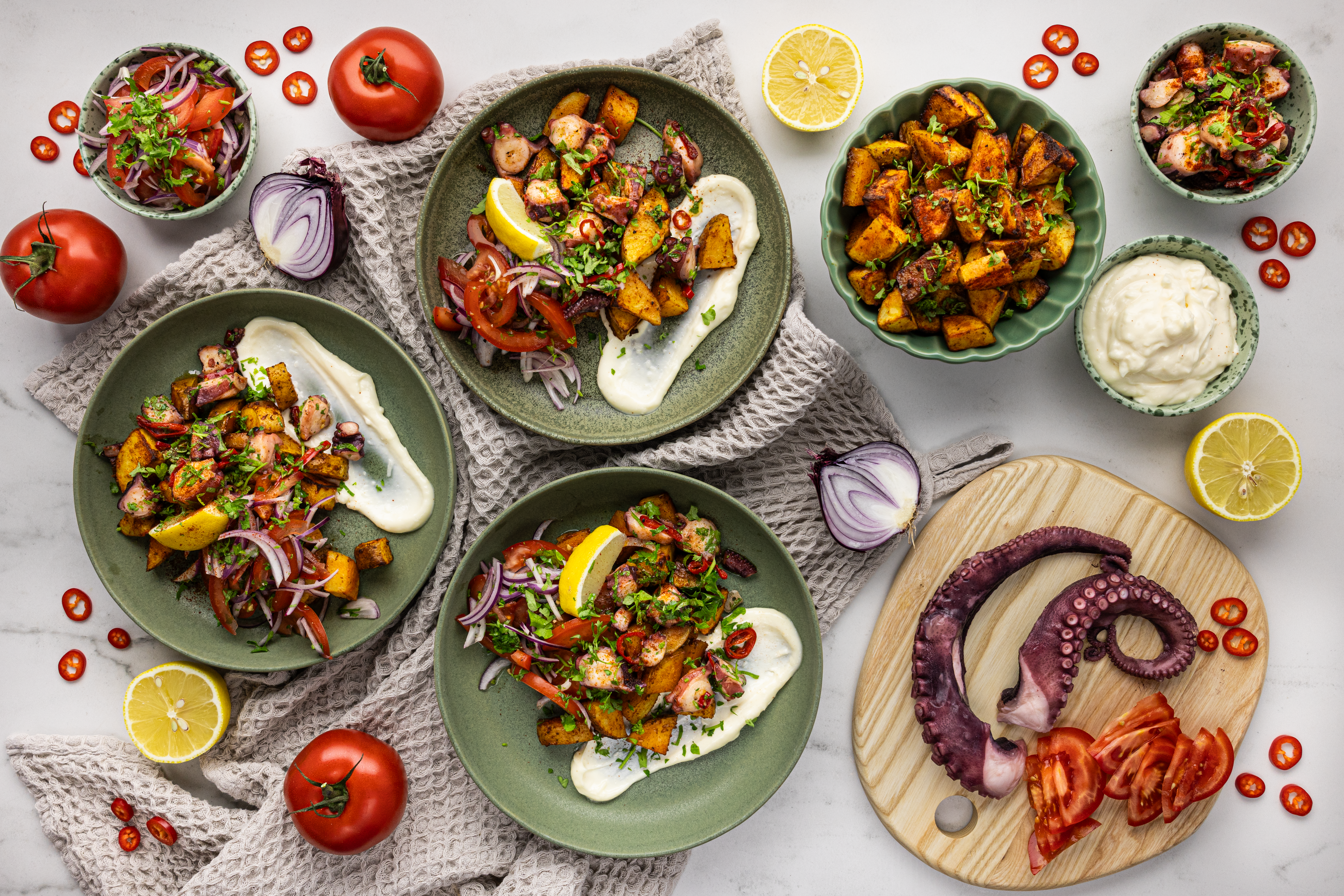 Sautéed Octopus with Patatas Bravas, Aioli, and Tomato Salad