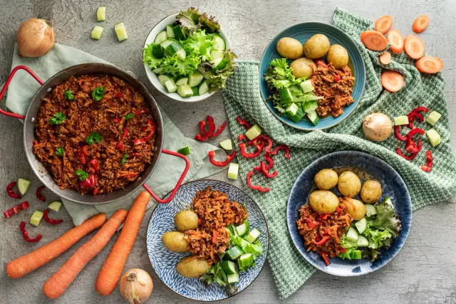 Minced Beef in Tomato Sauce with Roasted Potatoes and Fresh Salad