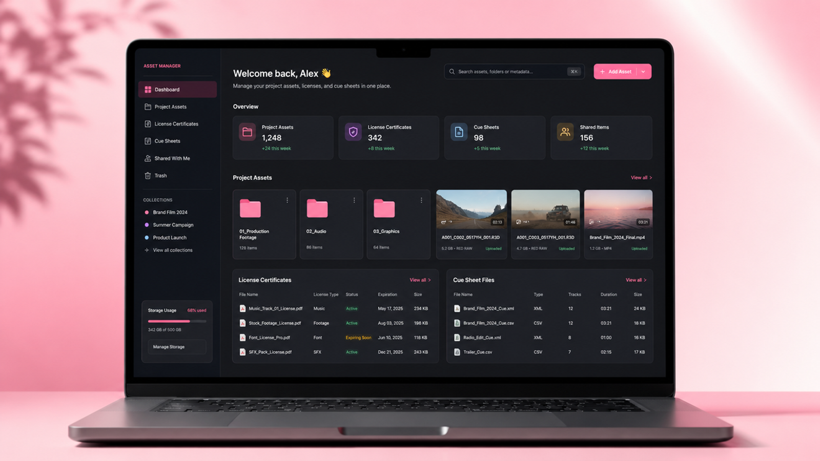 Laptop displaying a dark-mode Asset Manager dashboard organizing project assets, license certificates, cue sheet files, and storage usage.
