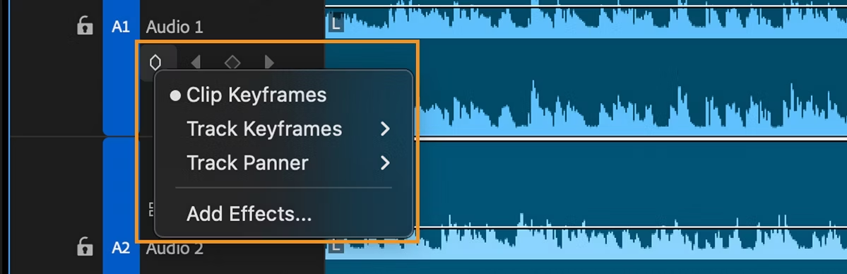 Select clip keyframes from the track menu to manually adjust volume and control your premiere music fade out.