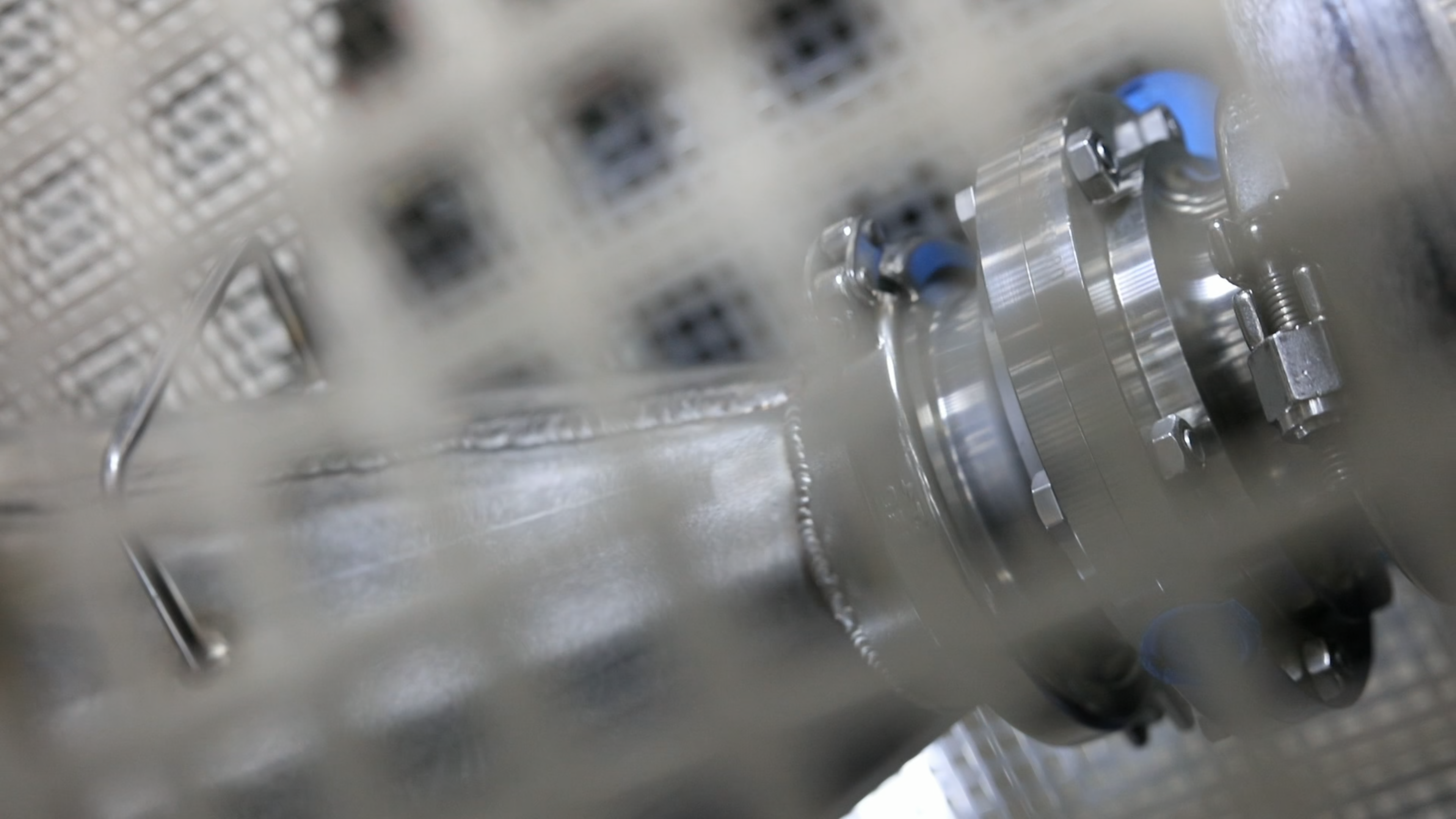 Pipe fitting behind a mesh guard