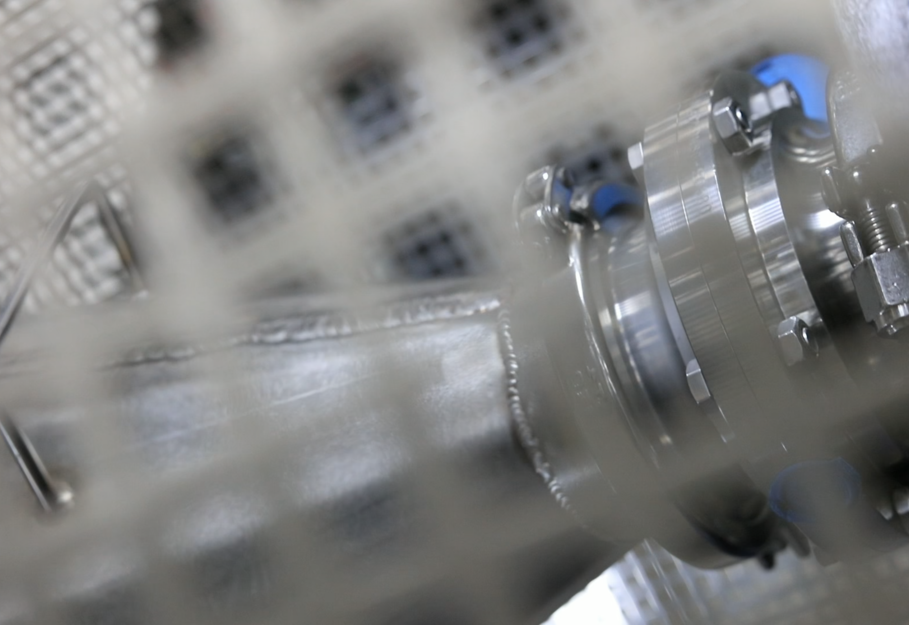Pipe fitting behind a mesh guard