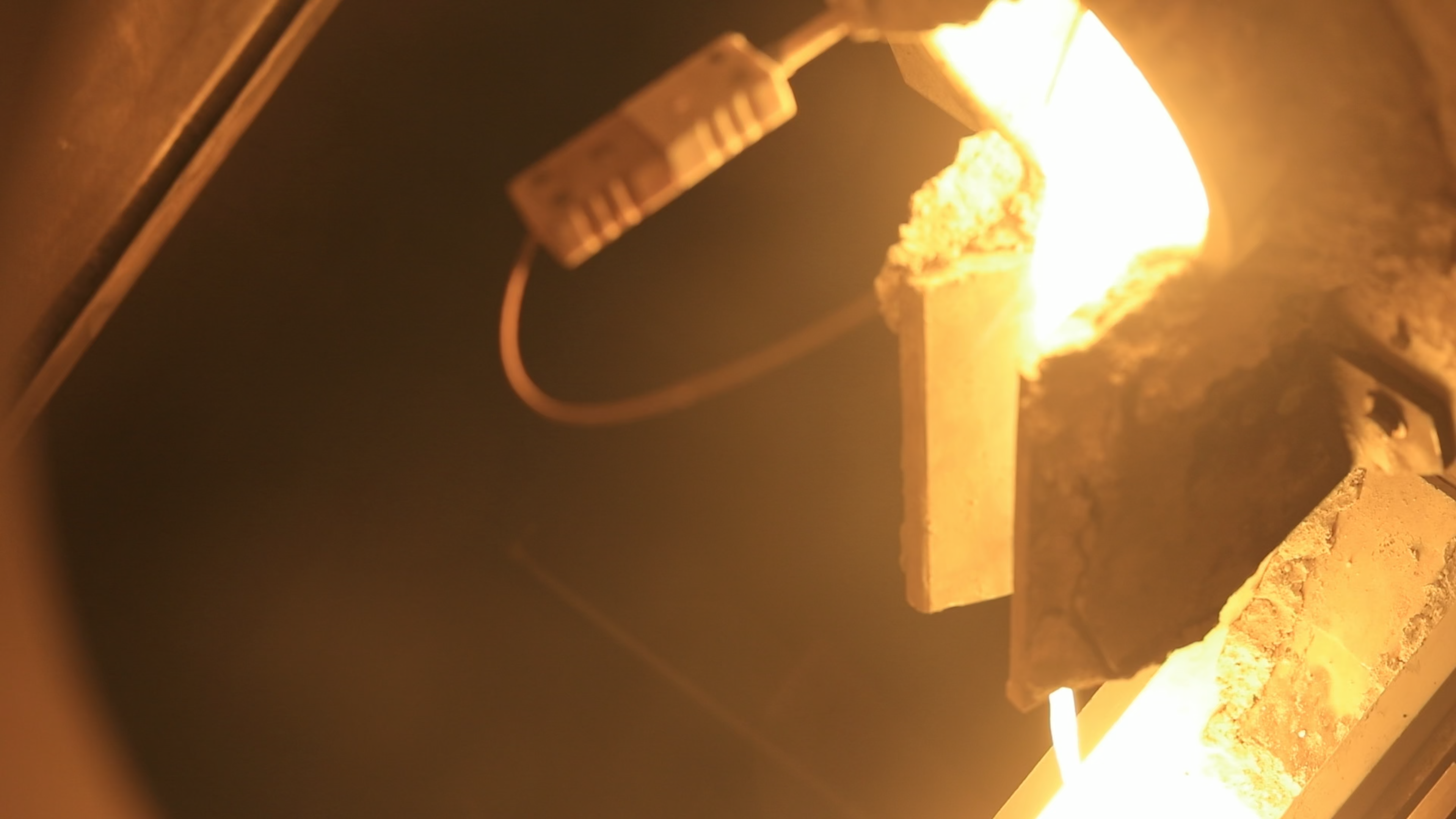 Molten metal pouring into a mould