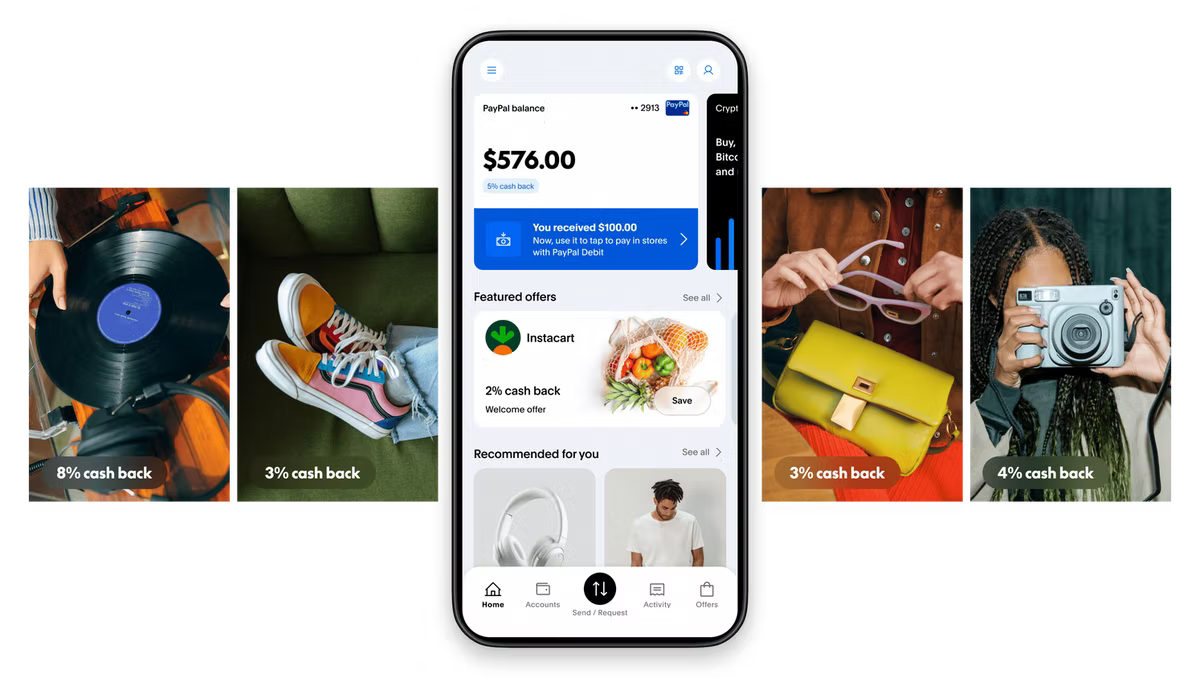 Phone screen showing a $576 PayPal balance with cashback offers. Background includes a vinyl record, colorful shoes, a yellow purse, and a camera.
