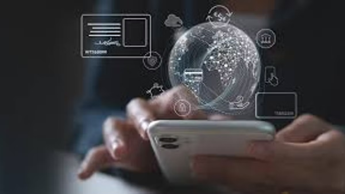 Hands holding a smartphone, with a translucent globe and floating icons for a card, a bank, security and delivery projected above the screen.