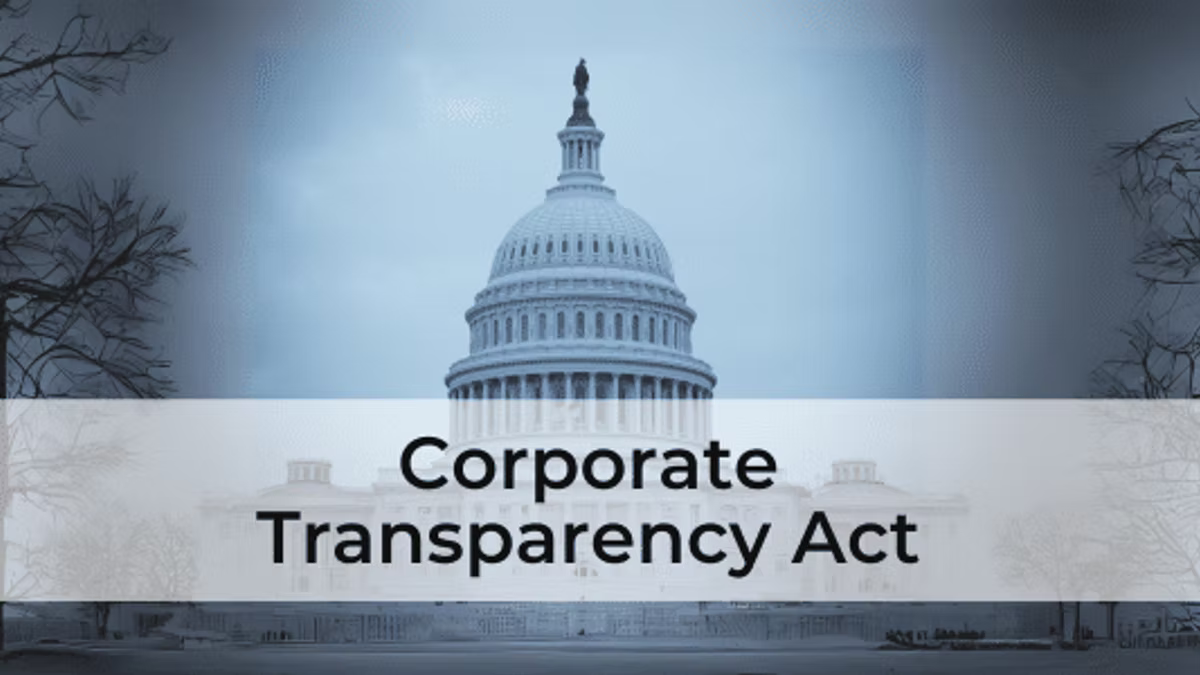 Hero card reading "Corporate Transparency Act" on a pale band across a desaturated photograph of the United States Capitol dome.