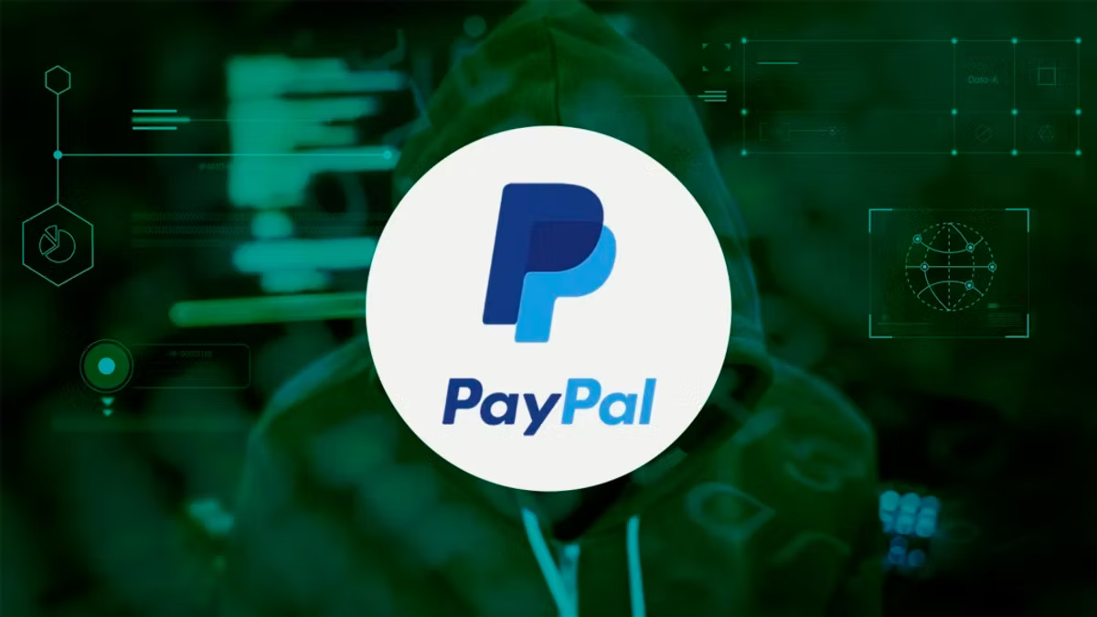 PayPal logo over a dark, green cyber-themed background with digital elements. A hooded figure is faintly visible, adding a mysterious mood.