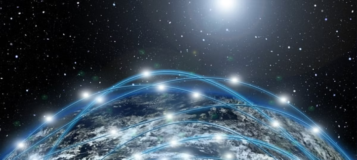 Arcs of blue light linking glowing nodes across the curve of the Earth, seen from space against a starfield.