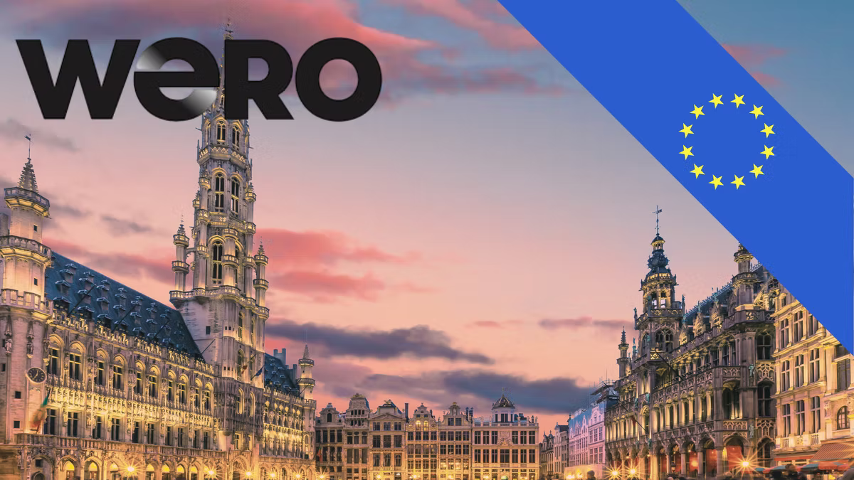 The Wero logo over a photograph of Brussels' Grand-Place at dusk, with an EU flag corner in the top right.