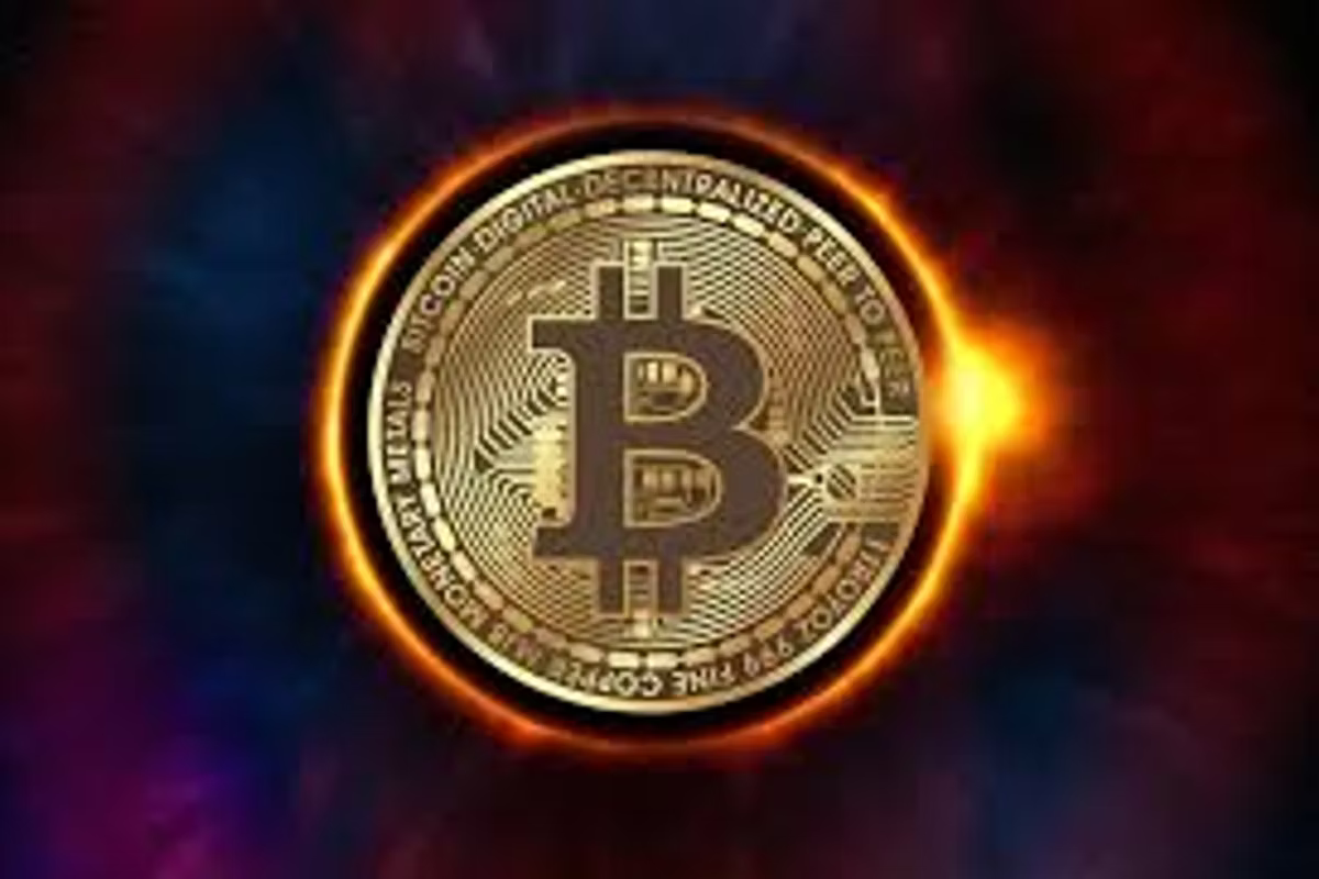 A gold Bitcoin coin glowing with an orange corona against a dark red and blue nebula background.