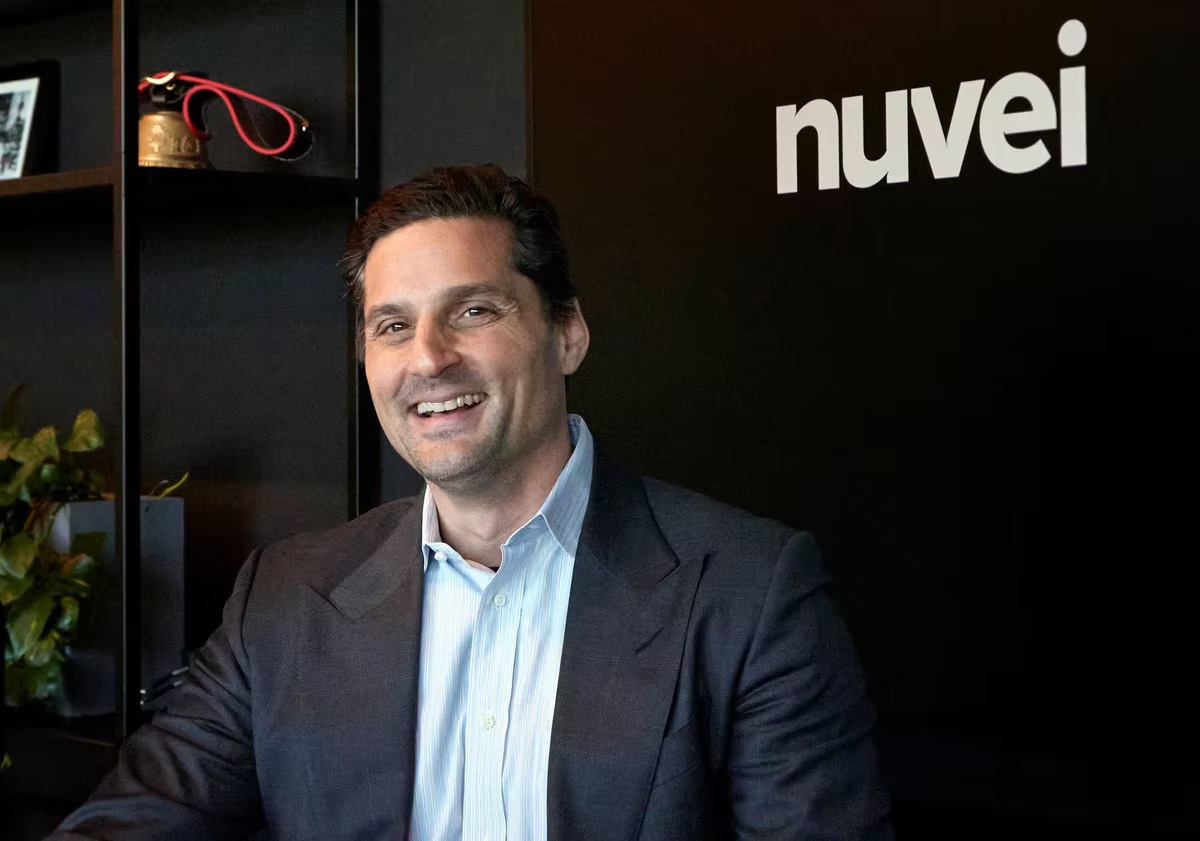 Nuvei CEO and Chair Phil Fayer smiles at the camera