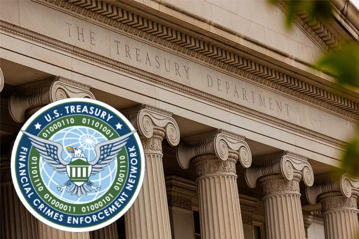 The seal of the U.S. Treasury's Financial Crimes Enforcement Network over a photograph of the Treasury Department building's columned facade.