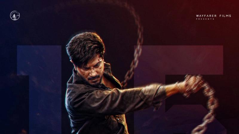 Dulquer Salmaan swings a chain in an official I'm Game poster